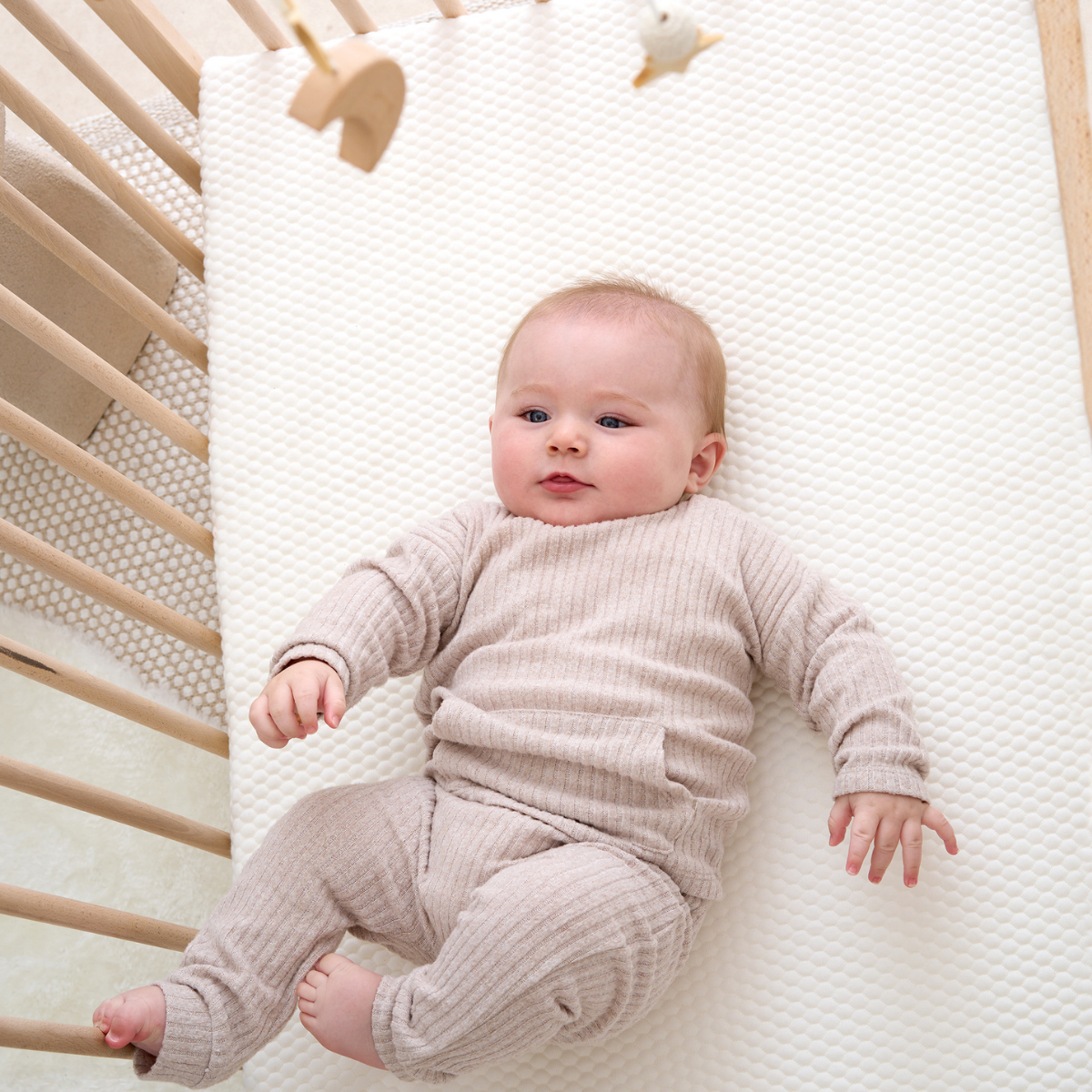 What Size Mattress Does a Cot Bed Need? (UK Size Guide)